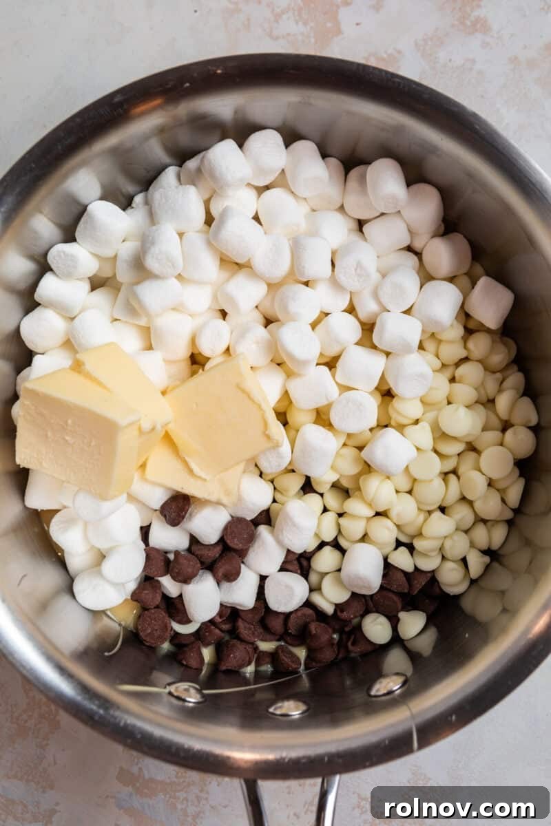 Marshmallows, butter, chocolate chips and sweetened condensed milk in sauce pan.
