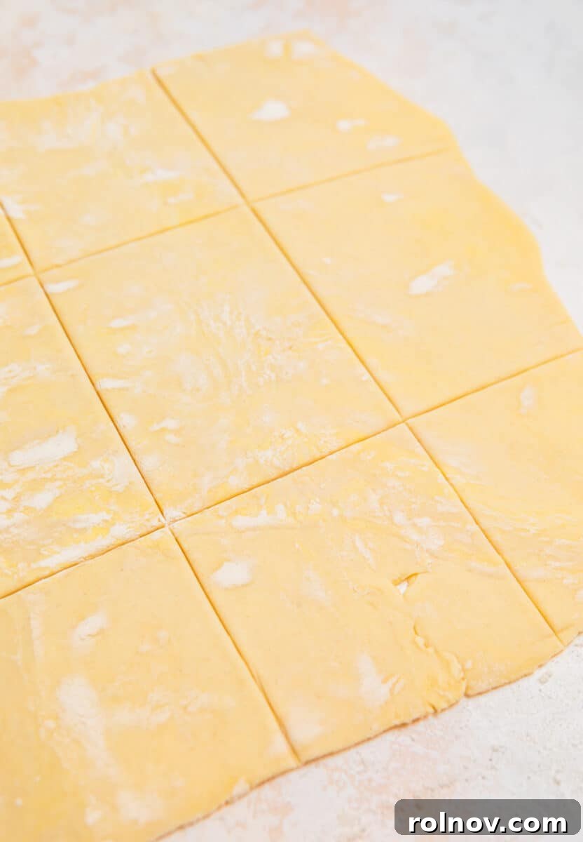 Buttery Flaky Quiche 7 Puff pastry rolled and cut into even pieces.