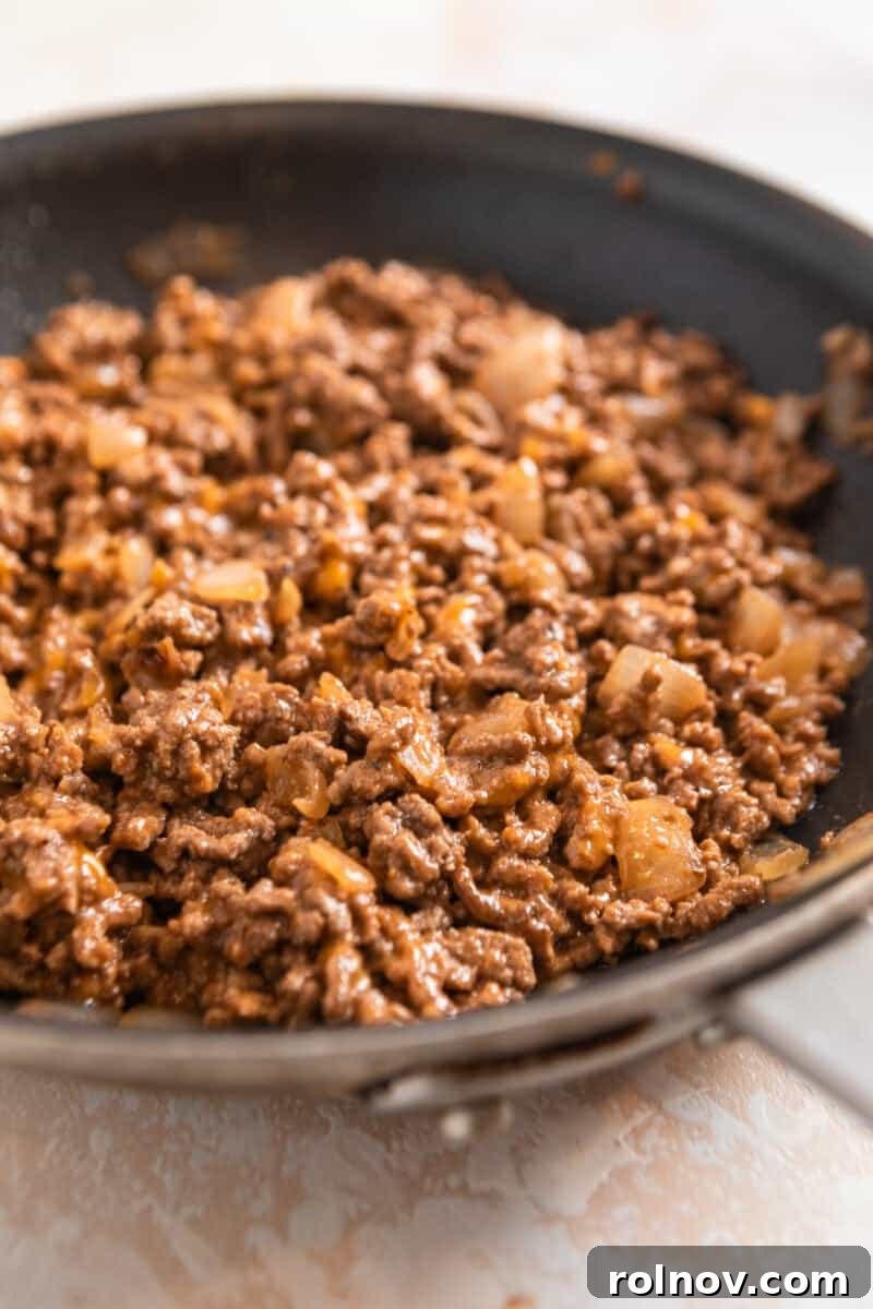 Cheesy Burger Potato Boats 10 Cheeseburger mixture in skillet.