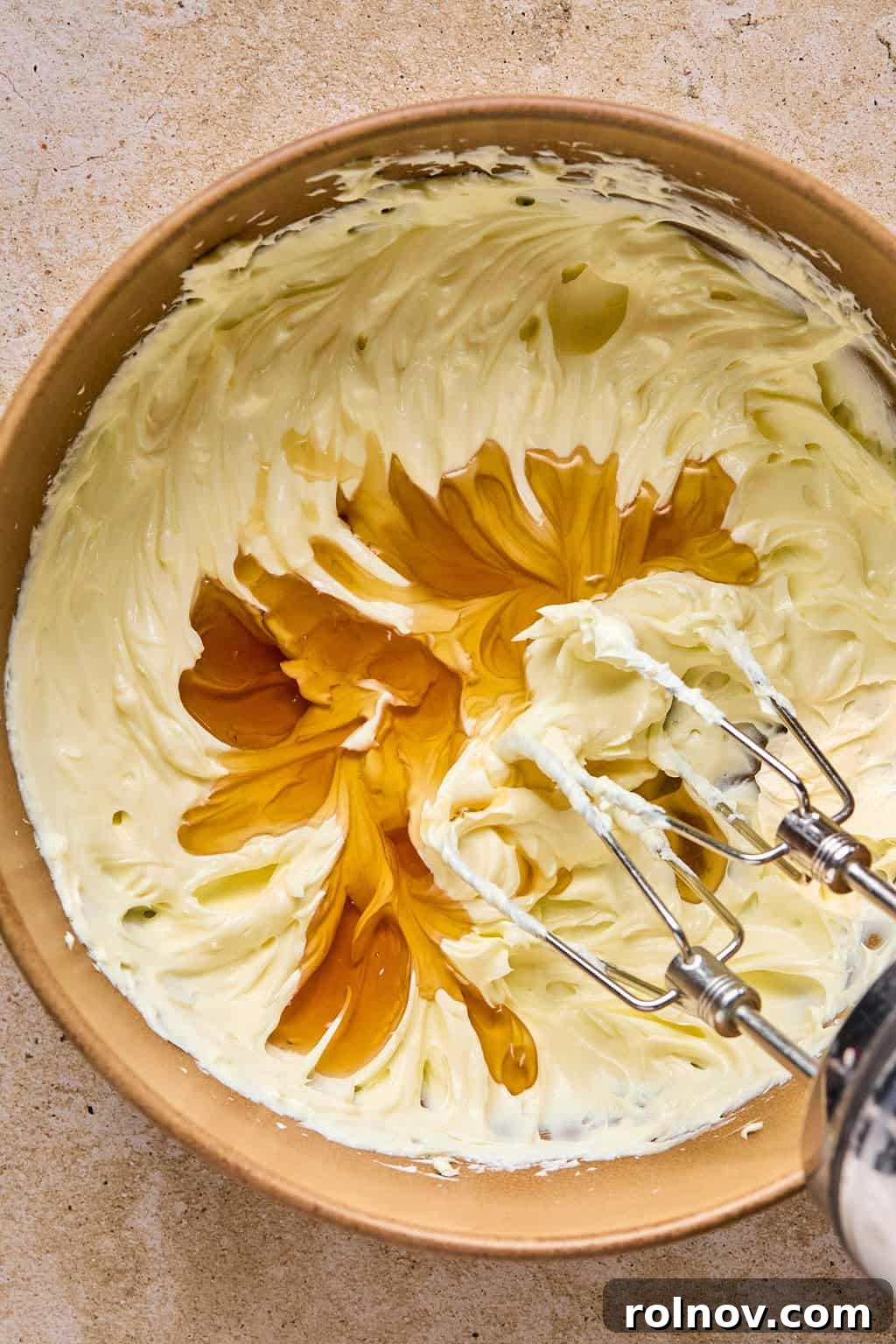Golden Spiced Molasses Pumpkin Chews 12 Maple added to bowl with cream cheese and butter mixture.