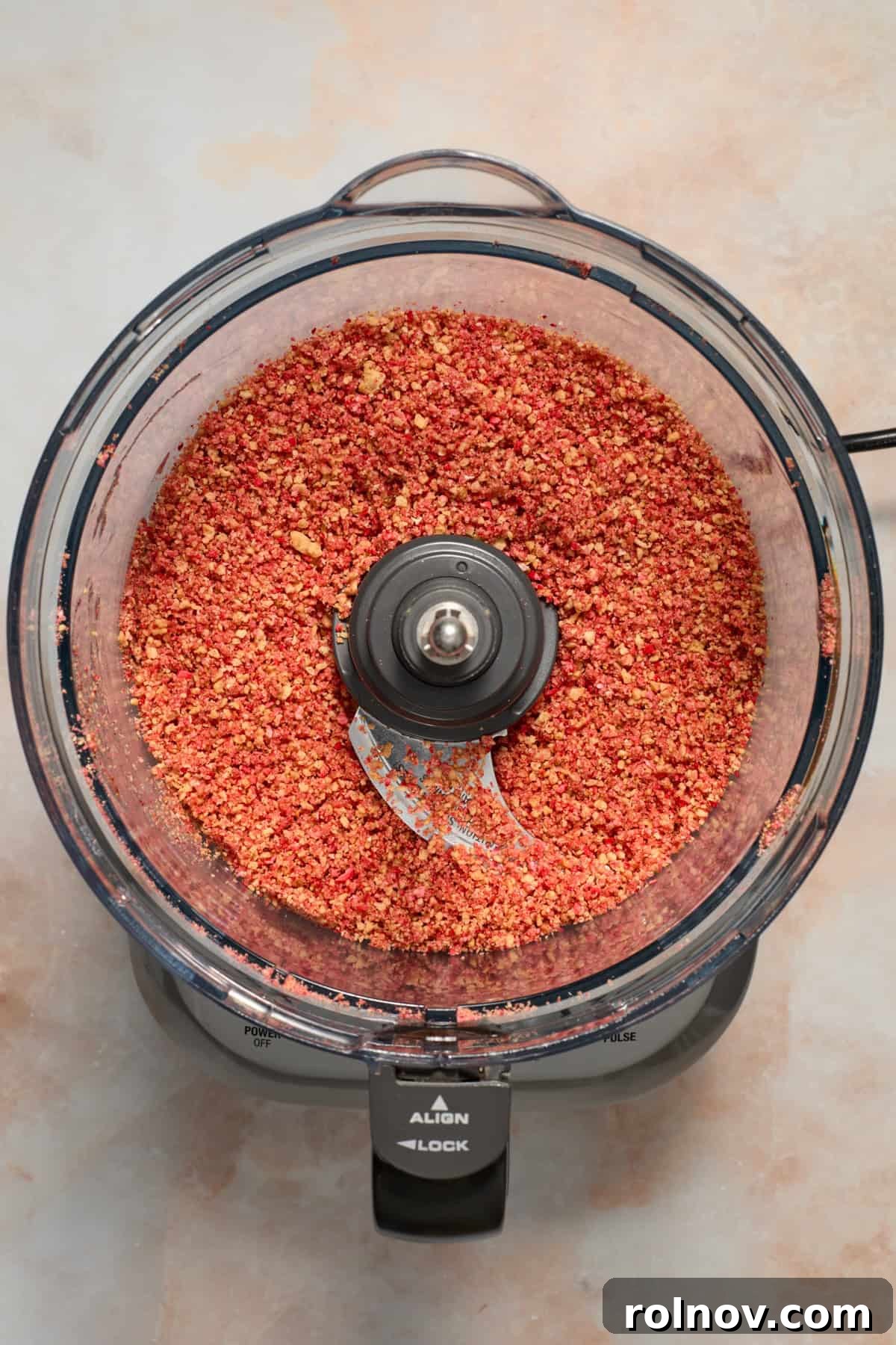 Berry Crunch Bliss Cupcakes 11 Strawberry crunch topping, finely processed and mixed, in a food processor bowl.