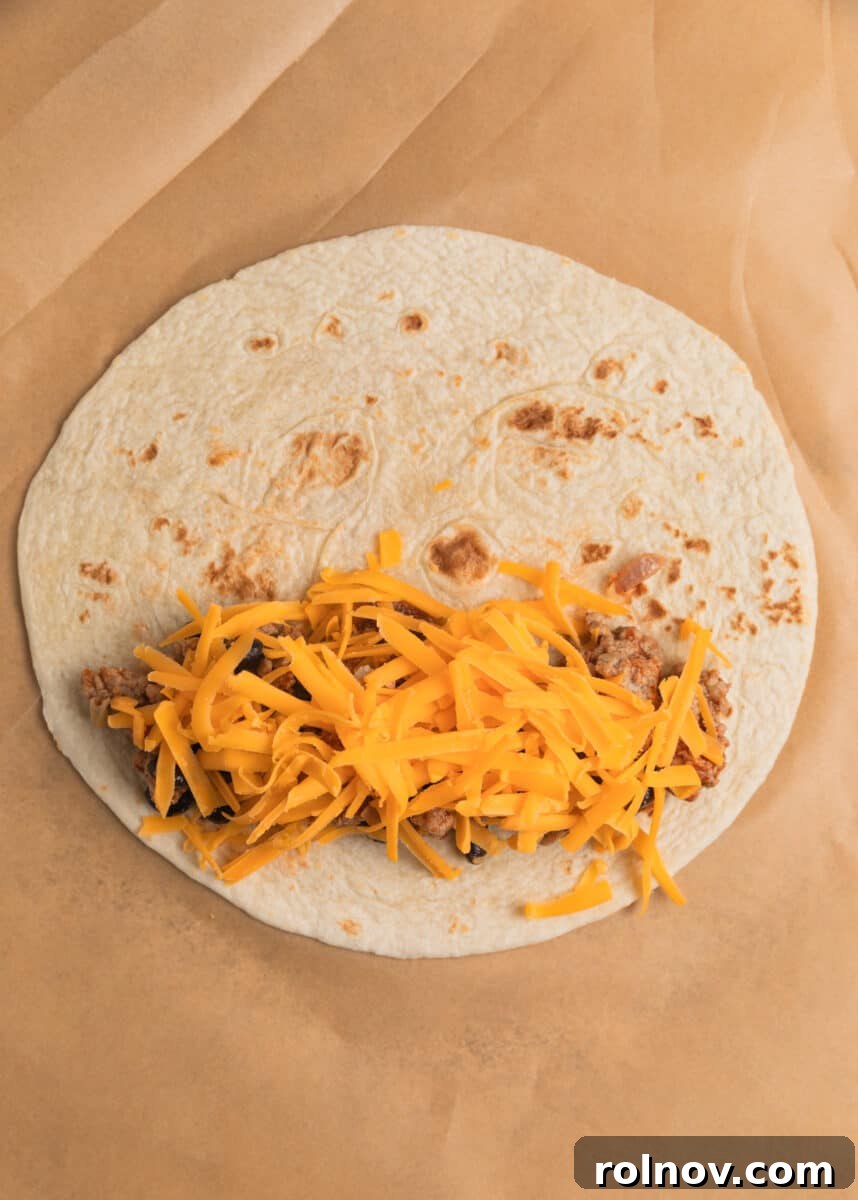 Cheese over top of ground turkey mixture.