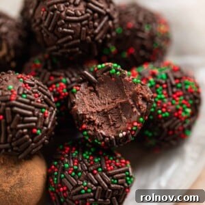 Effortless 5 Ingredient Amaretto Truffles 12 5 ingredient amaretto truffles on wax paper lined dish.
