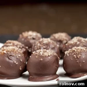 Delicious Snickerdoodle Oreo Cookie Balls dusted with cinnamon sugar.