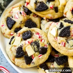 A white plate showcasing delicious Peppermint Oreo Cookies and white chocolate cookies.