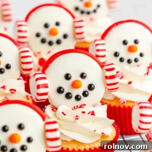 Cute Snowman Christmas Peppermint Cupcakes with Oreo earmuffs.