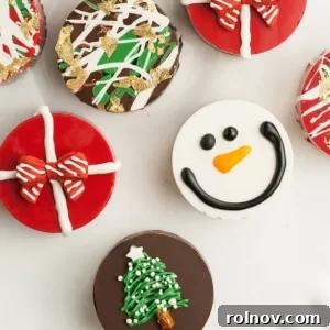 Oreos dipped in various colored chocolates and creatively decorated with Christmas themes.