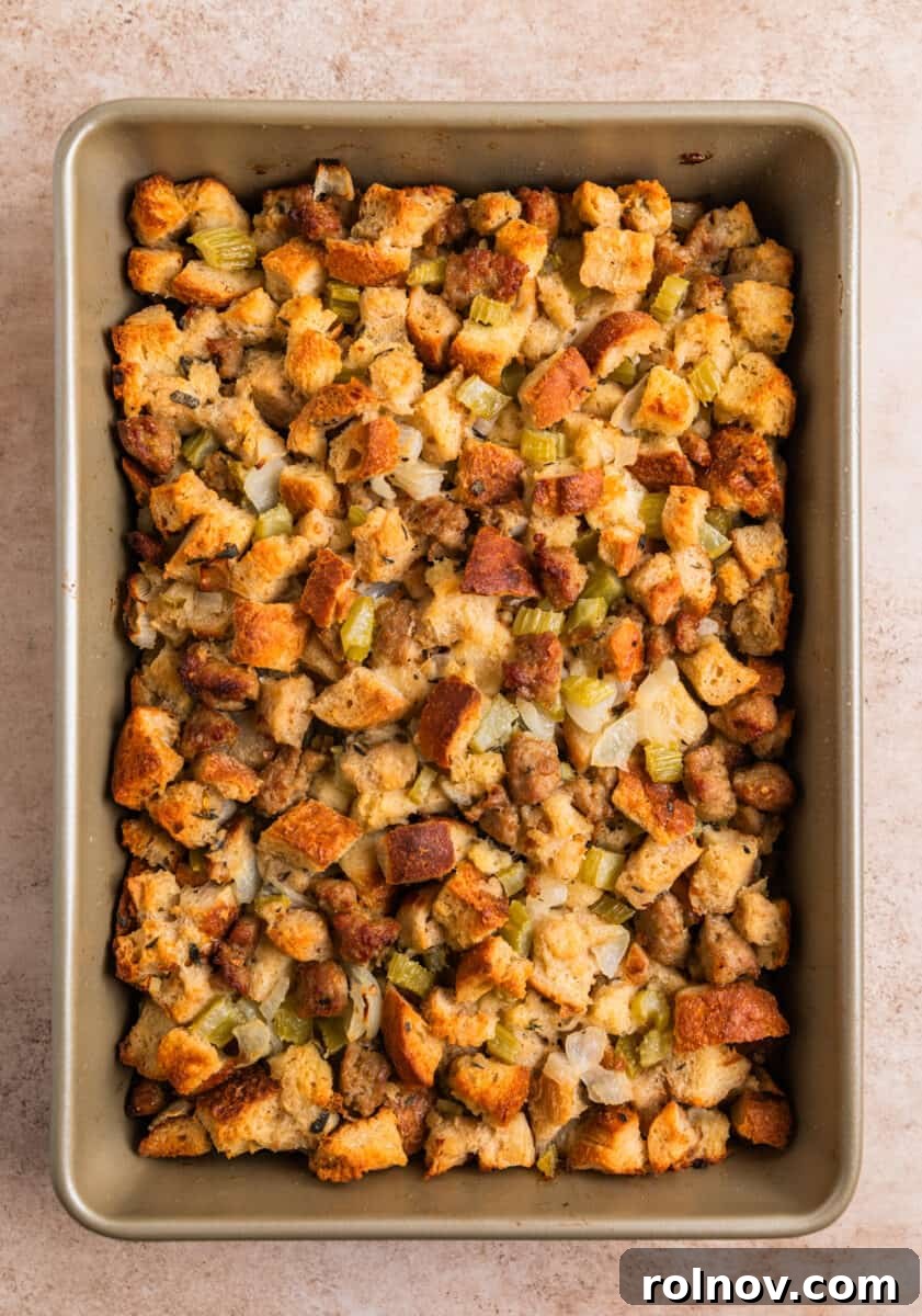 Classic Turkey Sausage Dressing 15 Freshly baked turkey sausage stuffing in a pan, golden brown and bubbling.