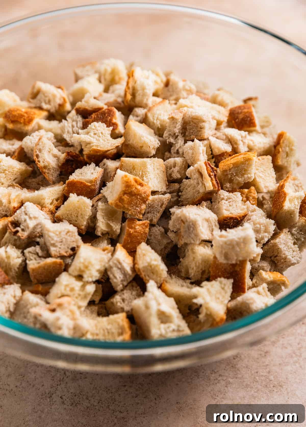 Classic Turkey Sausage Dressing 6 Stale bread cubes in a large mixing bowl.