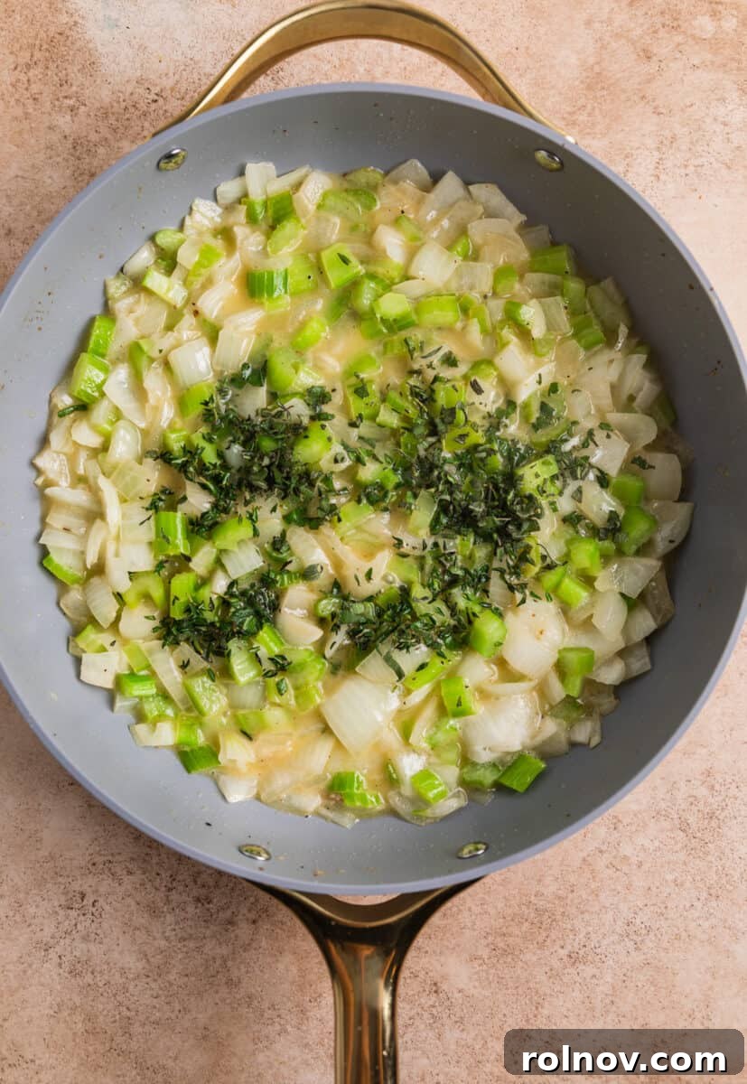 Classic Turkey Sausage Dressing 9 Sautéed onions and celery in a skillet with melted butter, topped with fresh herbs.