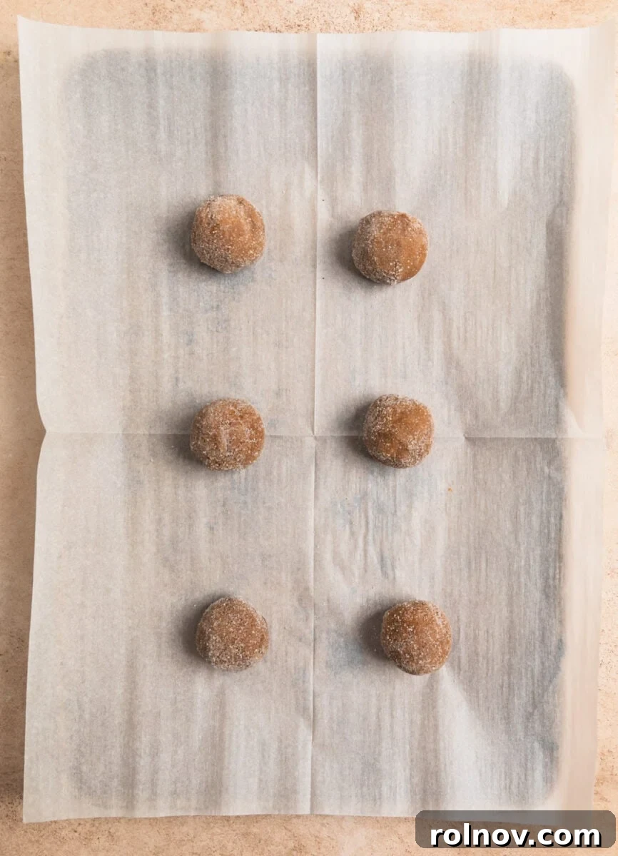 Ginger Cloud Cookies 11 Parchment lined baking sheet with cookies before baking.