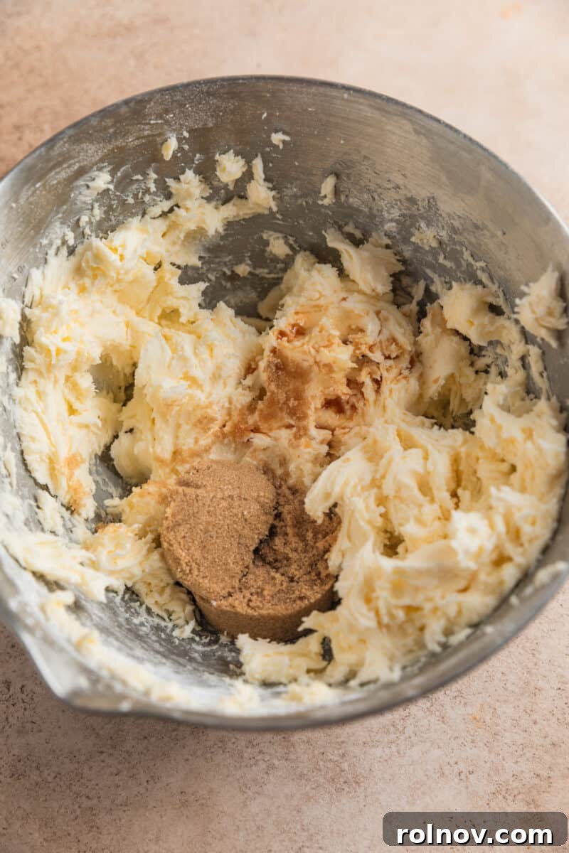 Ginger Cloud Cookies 14 Brown sugar added to mixing bowl with creamed butter.