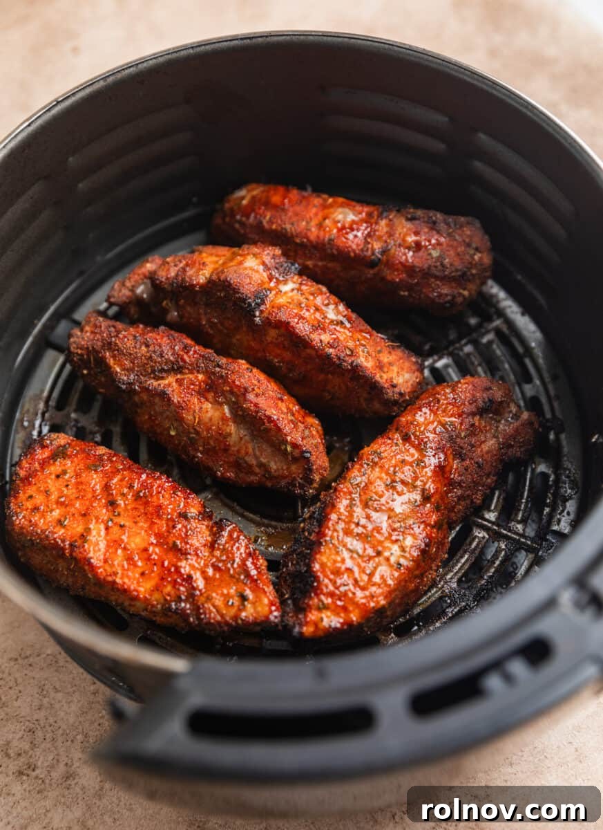 Crispy Air Fryer Country Ribs 8 Air fried country ribs before BBQ sauce spread on top.
