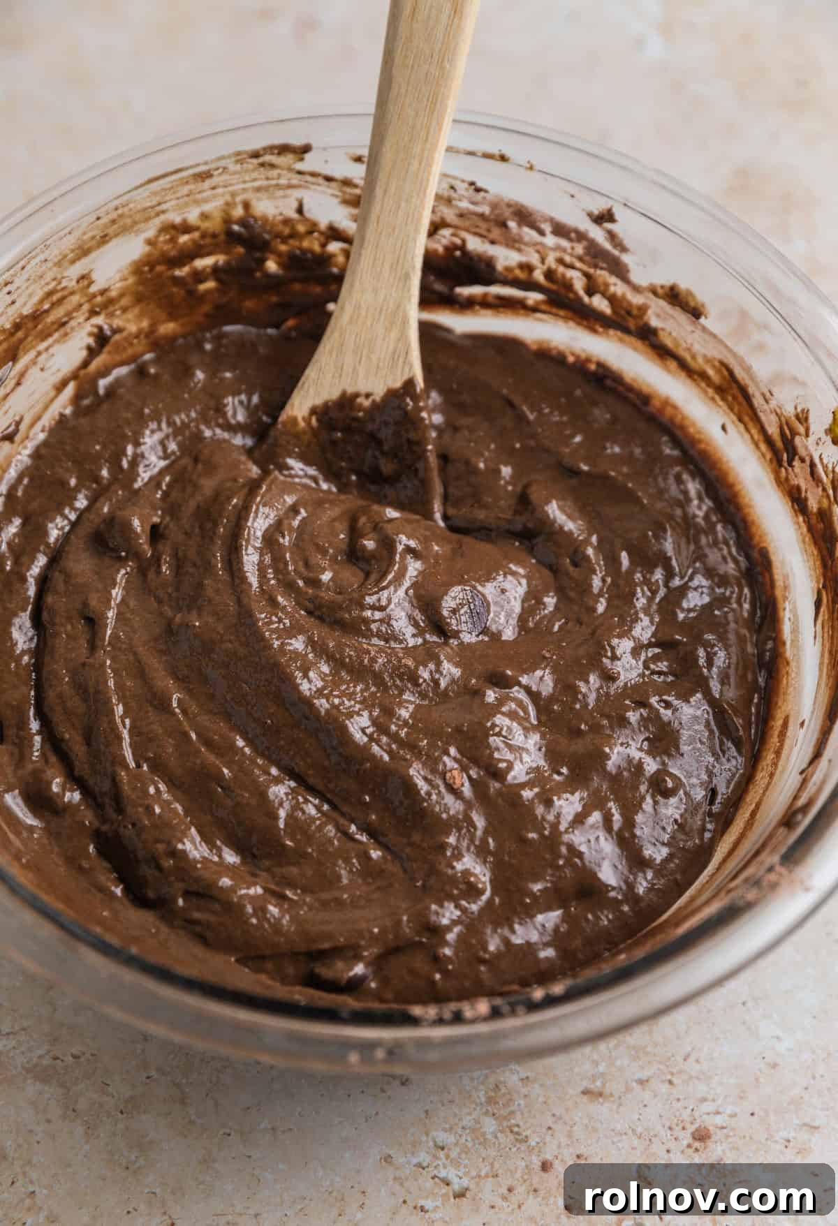 Emerald Chocolate Muffins 11 Green smoothie chocolate muffin batter in bowl.