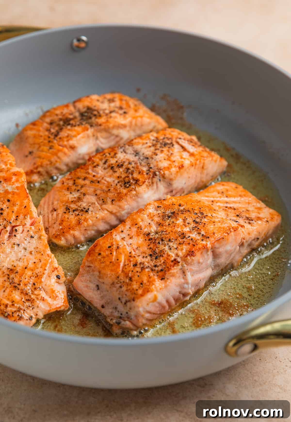 Zesty Lemon Dill Salmon 6 Seared salmon in skillet.