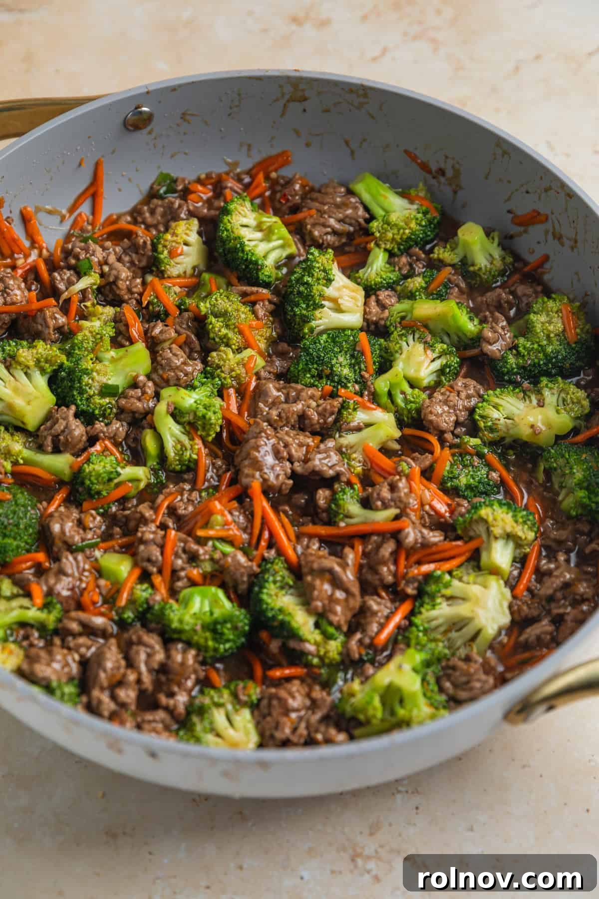 Sticky Teriyaki Ground Beef 8 Teriyaki sauce added to skillet with beef and vegetable stir fry.