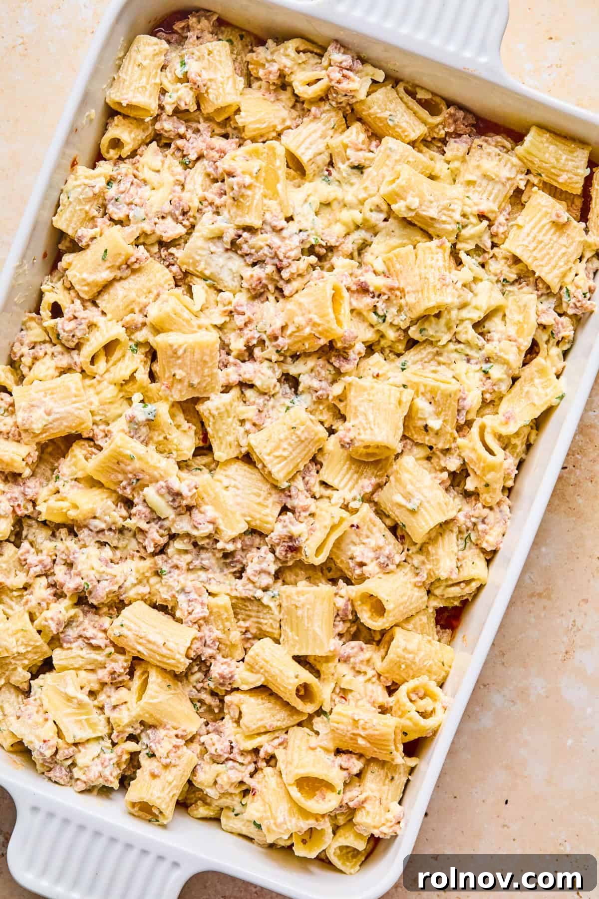 Rustic Italian Sausage Pasta Casserole 11 Pasta mixture added over top of marinara sauce.