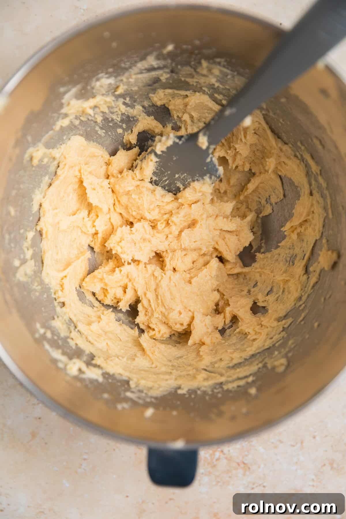 Irresistible Nutella Thumbprints 6 Cookie dough in mixing bowl with just wet ingredients combined.