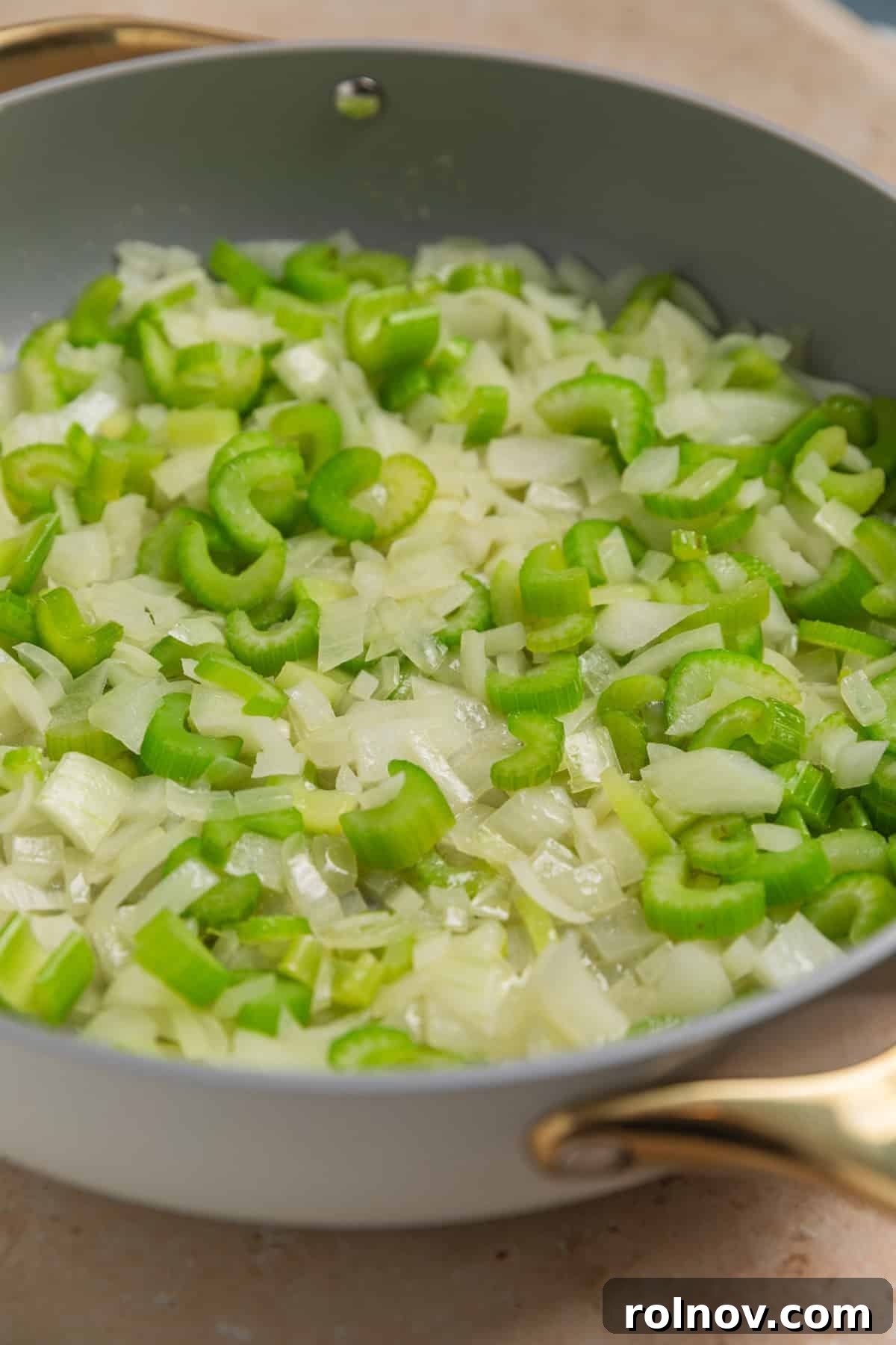 Southern Beef Cornbread Dressing 5 Sautéed celery and onion in skillet.
