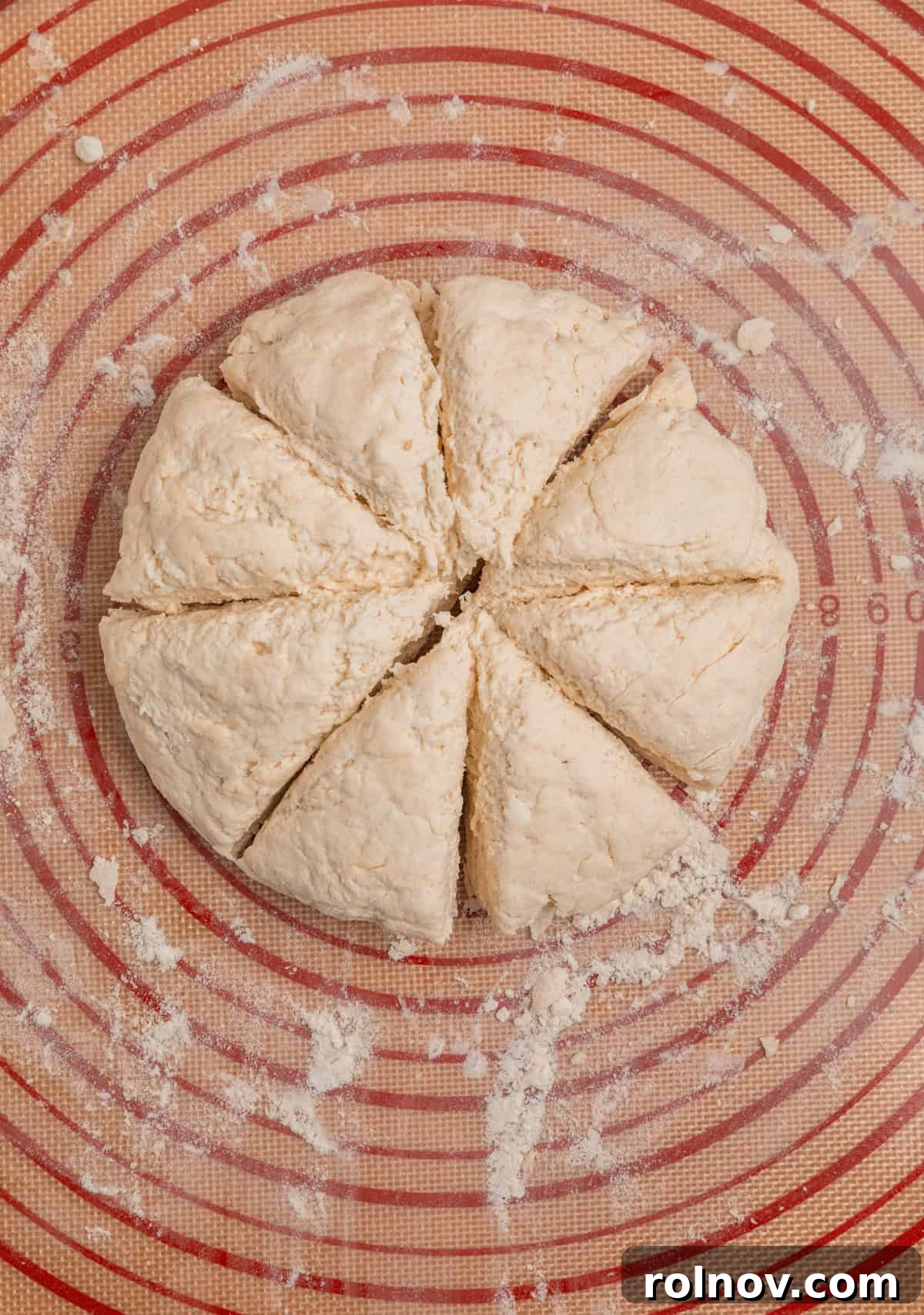 Dinner roll dough in round cut into 8 even pieces.
