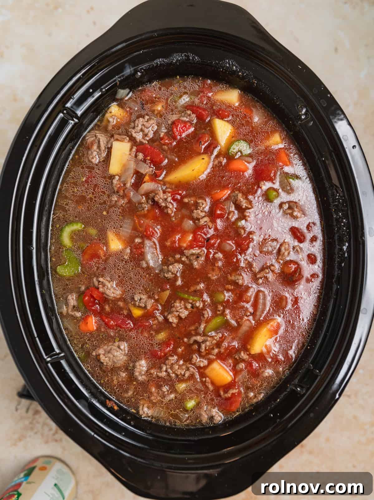 Hearty Slow Cooker Ground Beef Soup 6 Beef broth added to crockpot hamburger soup mixture before cooking.