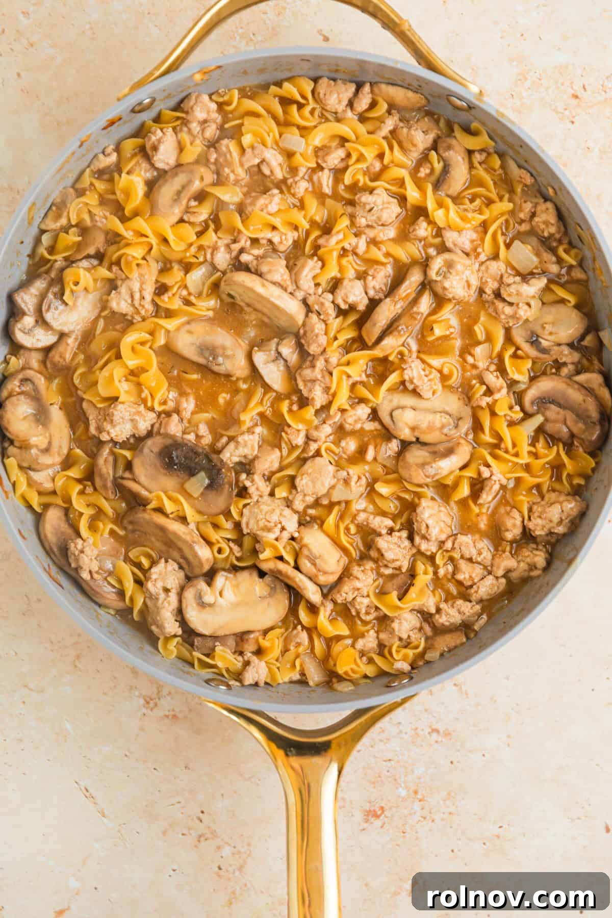 Creamy Ground Turkey Stroganoff 8 Cooked egg noodles in turkey stroganoff cooked in skillet.
