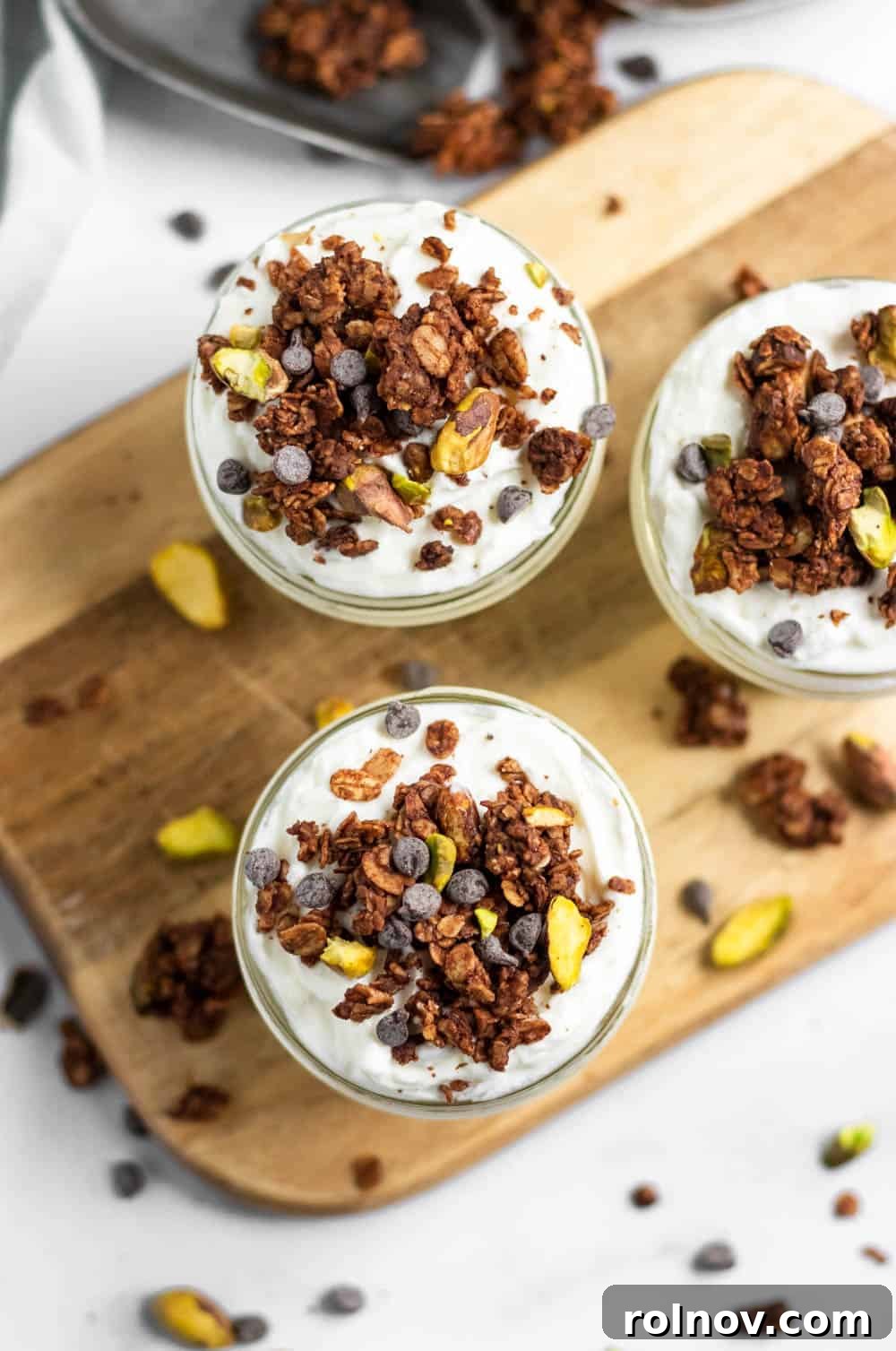 Sweet Salty Chocolate Pistachio Granola 4 Overhead shot of freshly baked chocolate granola with pistachios, ready to be broken into clusters.