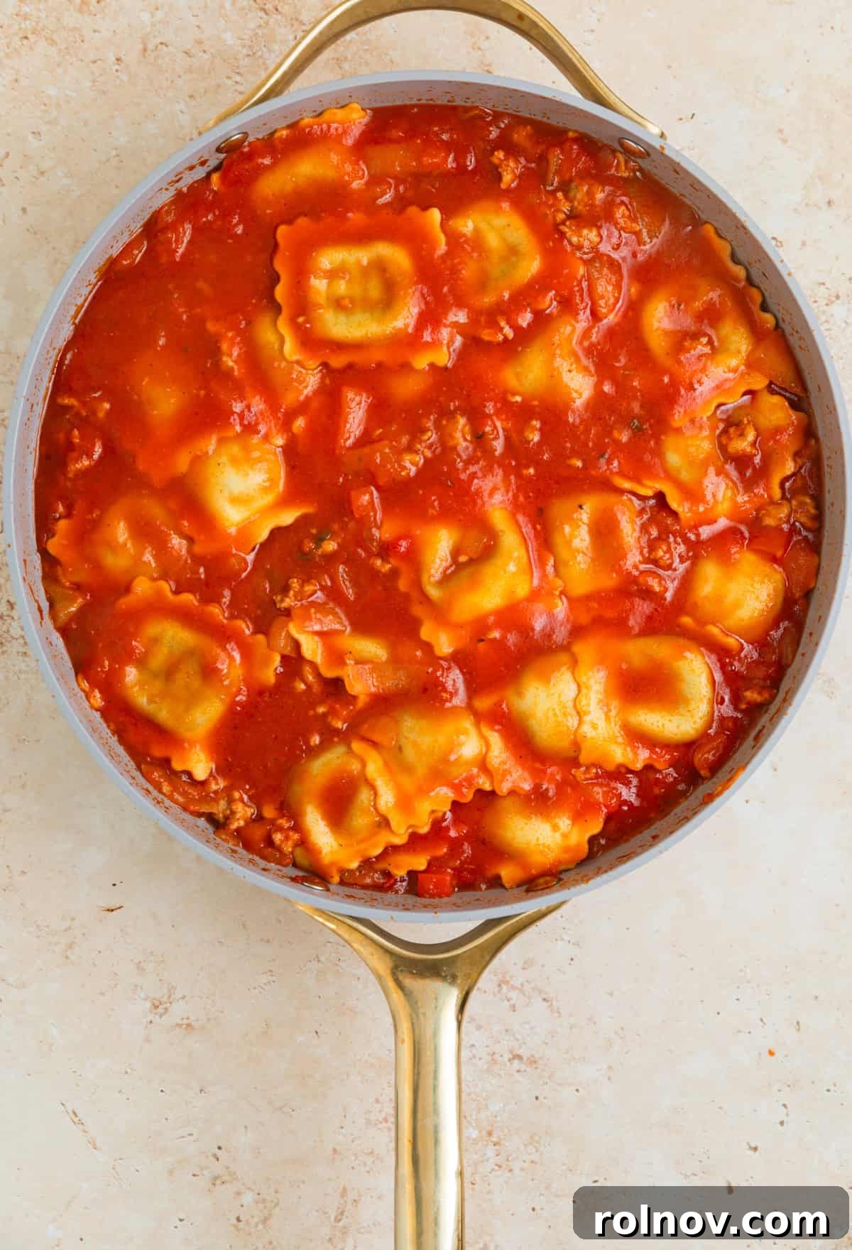 One-Pan Ravioli Lasagna 9 Lasagna cooked al dente in skillet with marinara.