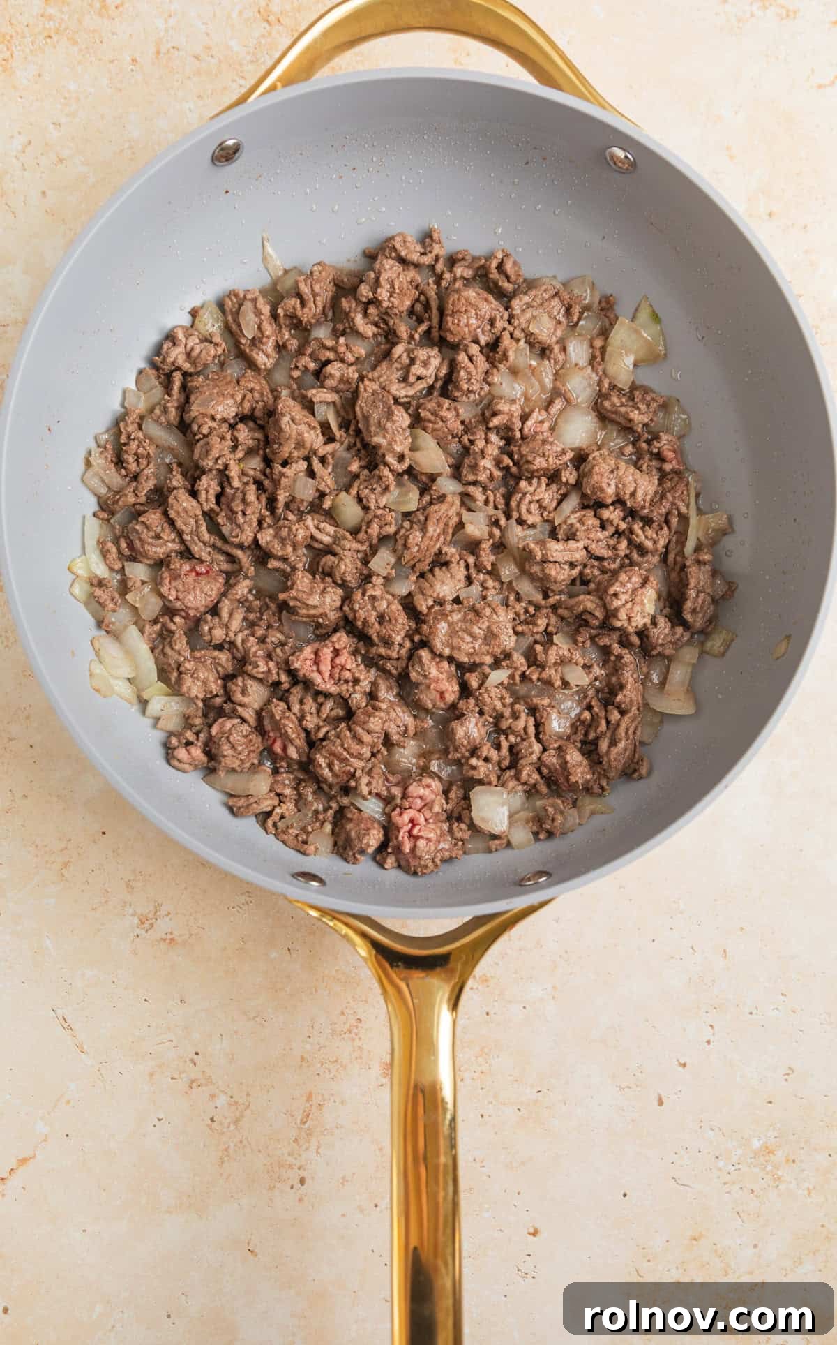 Creamy One-Pot Ground Beef Stroganoff 4 Ground beef and onions in skillet.