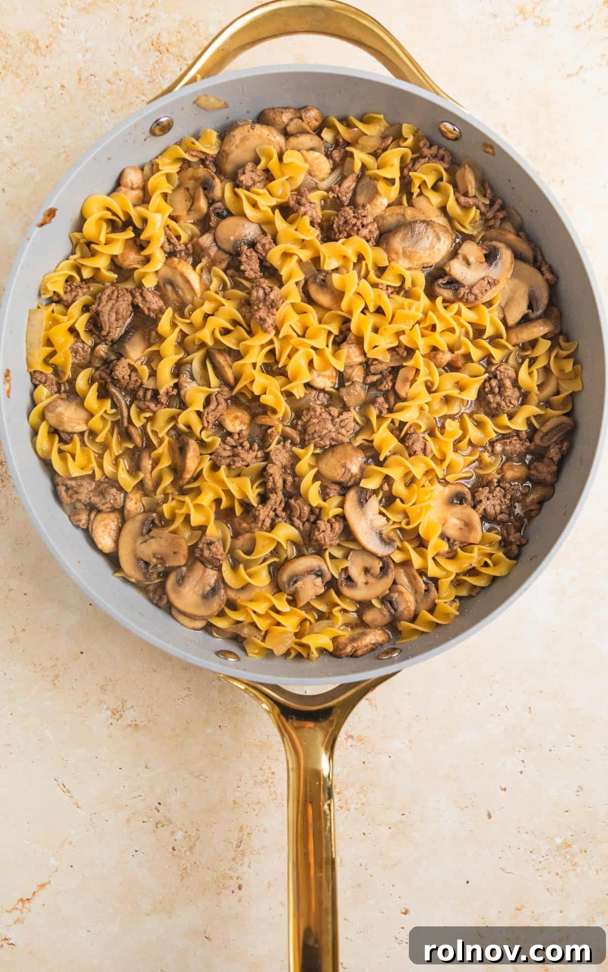 Creamy One-Pot Ground Beef Stroganoff 8 Pasta and beef stroganoff in skillet.
