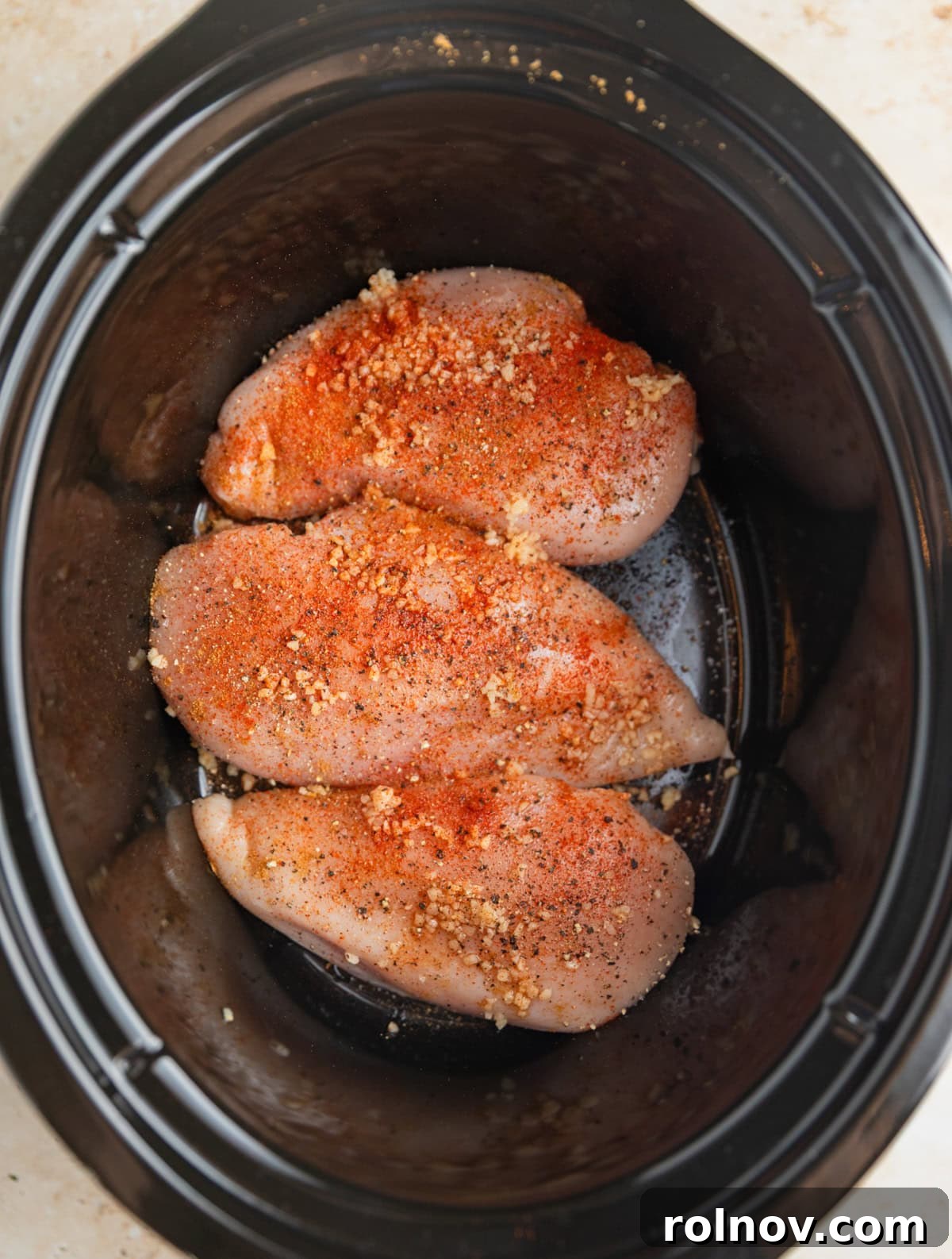 Fall-Apart BBQ Chicken Tacos with Zesty Slaw 3 Seasoned chicken breast in crockpot.