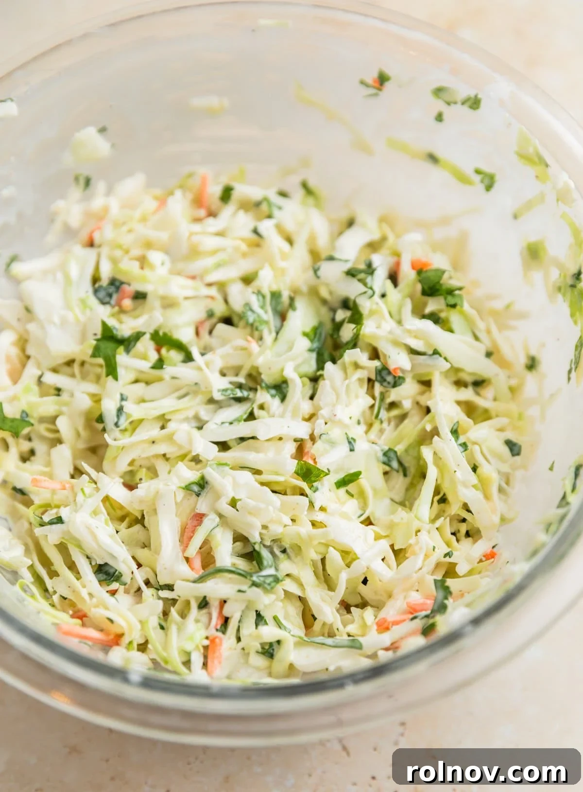 Fall-Apart BBQ Chicken Tacos with Zesty Slaw 8 Cilantro lime slaw mixed in bowl.