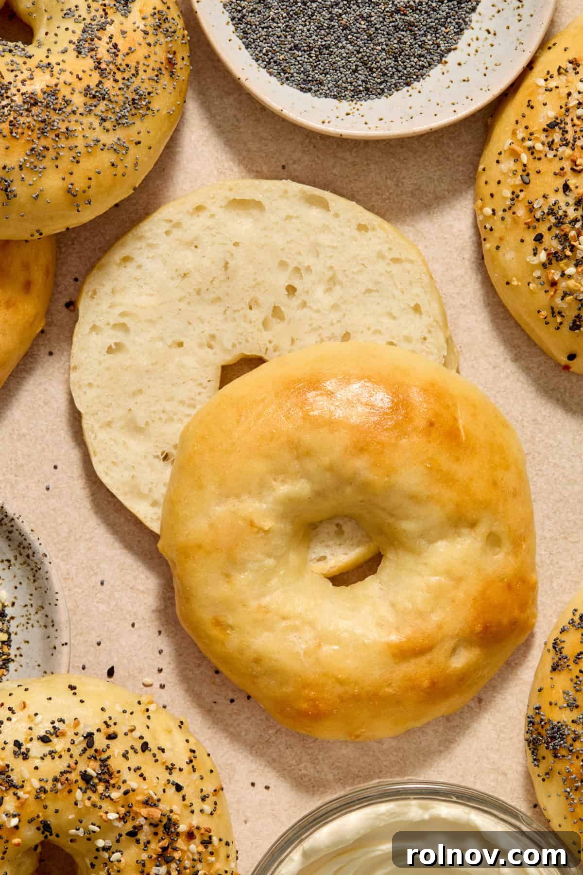 Inside a Greek Yogurt Protein Bagel A freshly baked Greek yogurt protein bagel sliced in half, revealing its soft, fluffy, and perfectly textured interior.