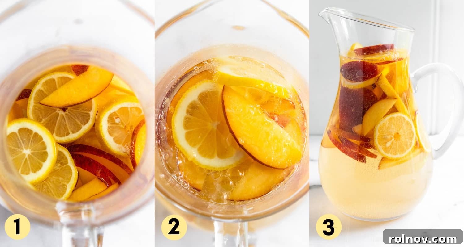 Sun-Kissed Peach Ginger Sangria 4 Freshly sliced peaches and lemons submerged in white wine and ginger beer within a clear glass pitcher, showing the vibrant infusion process.