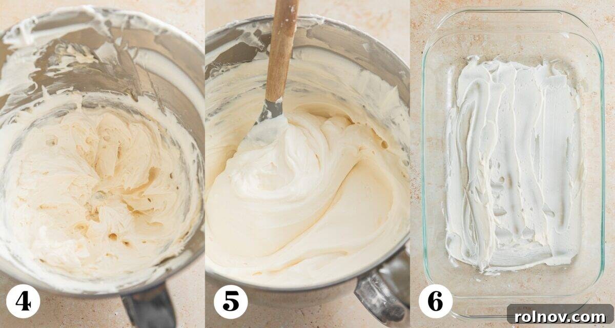 No-Bake Strawberry Dream Cake 5 The process of combining cream cheese and whipped cream to create a fluffy filling, followed by spreading a thin initial layer on the bottom of a glass baking pan as the foundation for the icebox cake.
