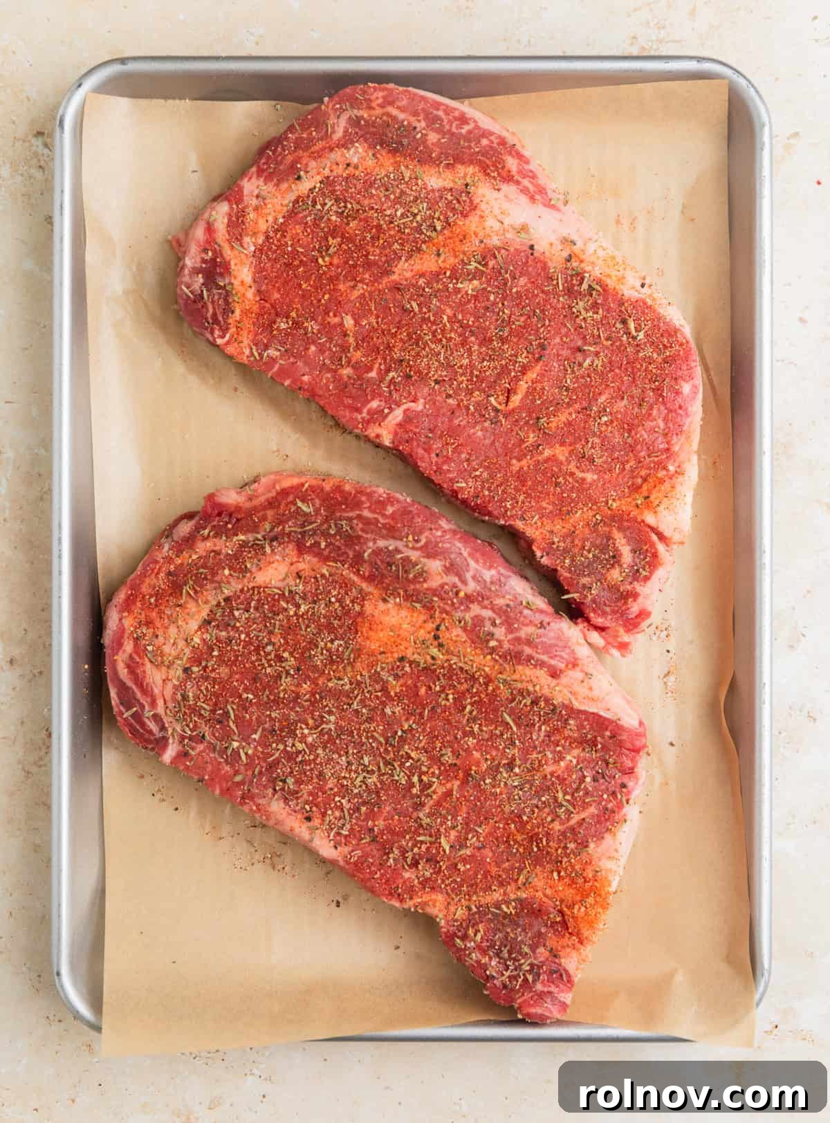 Ribeye Perfection with Gorgonzola Cream 5 Seasoned ribeye steaks on parchment lined pan.