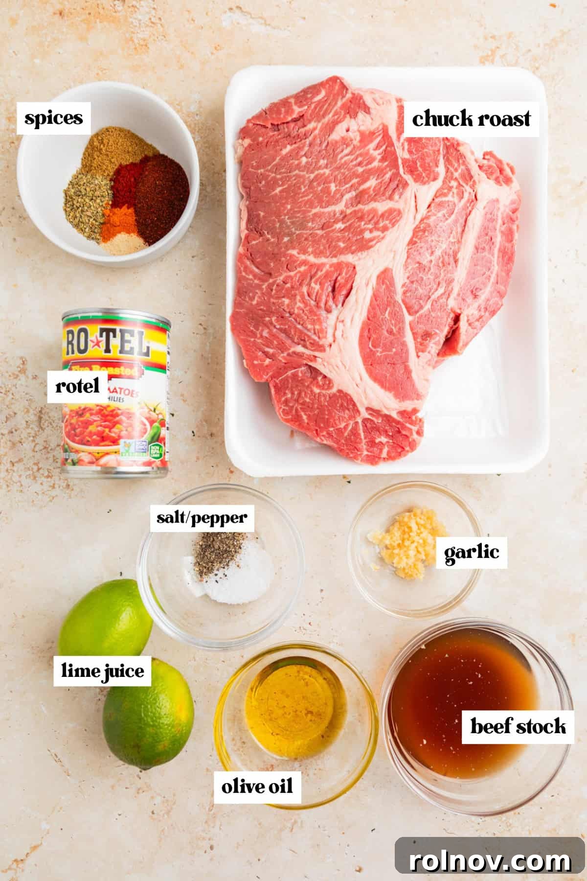 Melt In Your Mouth Slow Cooker Beef Tacos 3 Chuck roast, limes, spices and other labeled ingredients for recipe.
