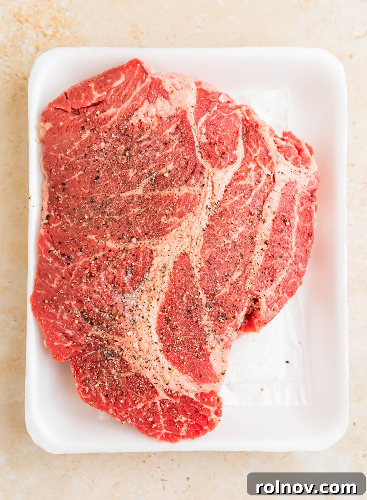 Melt In Your Mouth Slow Cooker Beef Tacos 4 Piece of raw chuck roast seasoned before searing.
