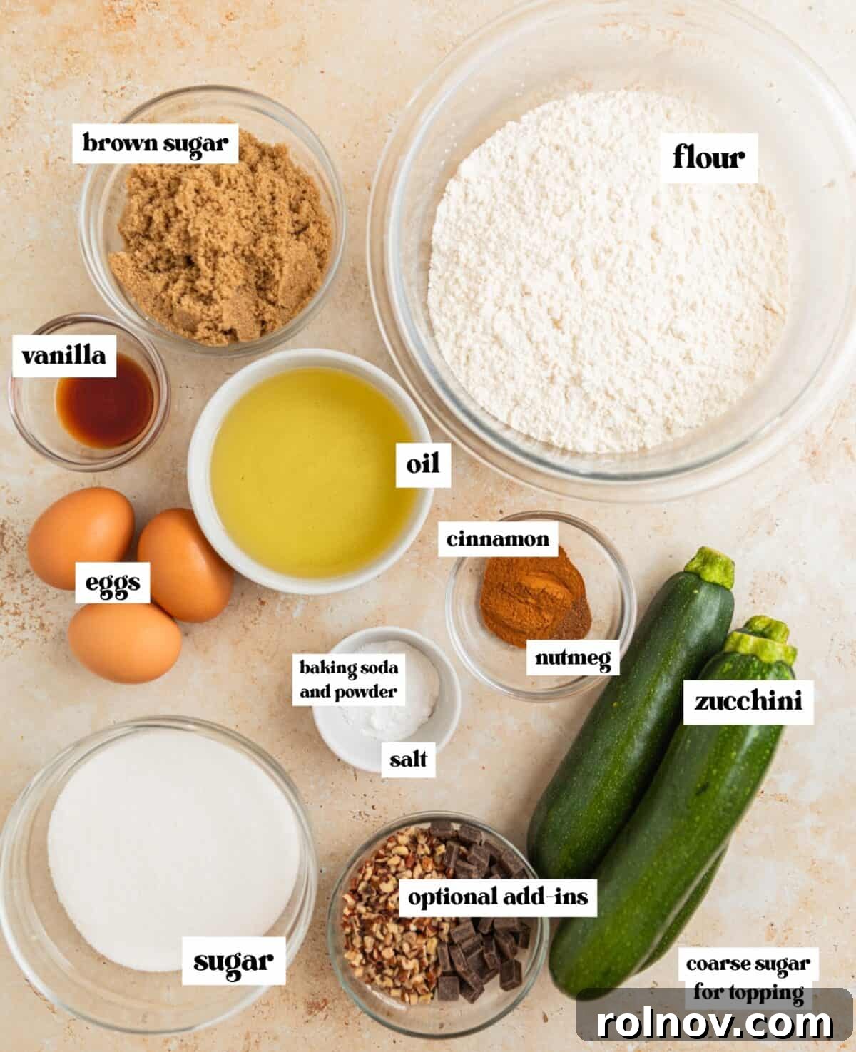 Grandmas Zucchini Bread Perfected 4 A meticulously arranged collection of baking ingredients including flour, various sugars, and oil, ready for the zucchini bread recipe.