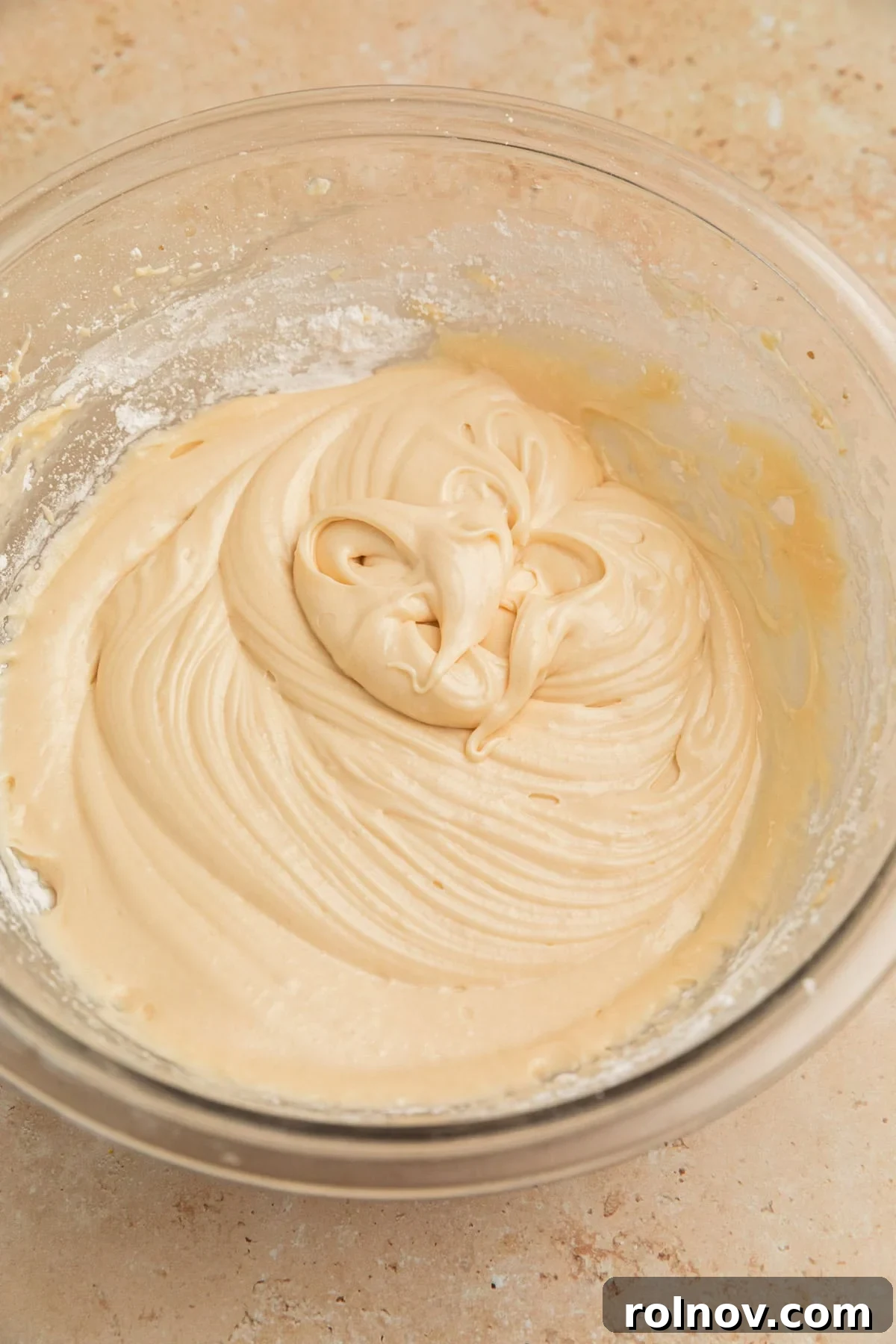 Effortless Cake Mix Pumpkin Bread 14 Smooth and creamy brown sugar cream cheese icing in a mixing bowl, chilled and ready to be spread.