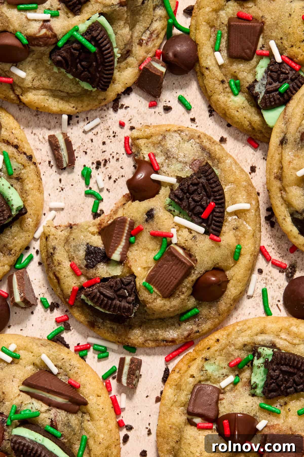 Mint chocolate chip cookies adorned with festive Christmas sprinkles, ready for the holidays.