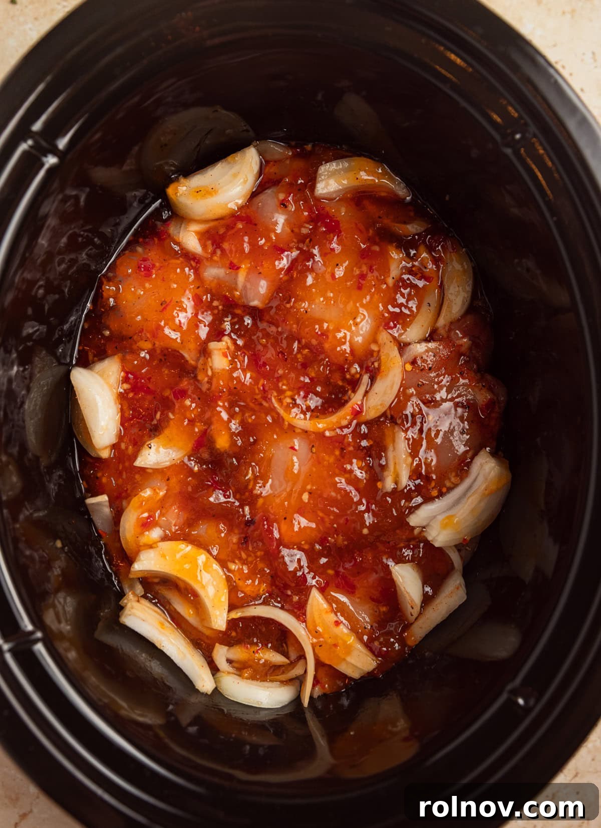 Sweet and Savory Apricot Slow-Cooked Chicken 6 Apricot chicken in crockpot before cooking.