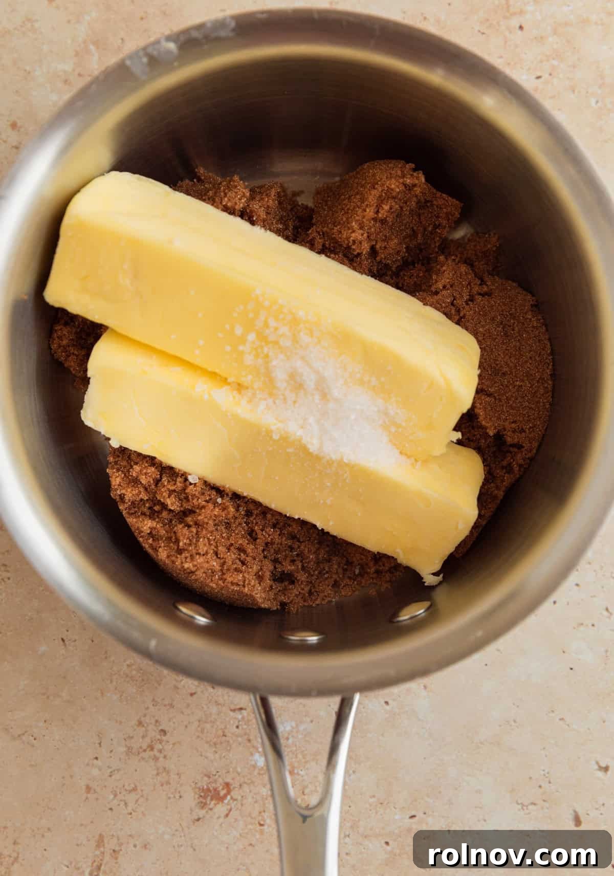 Salty Sweet Pretzel Toffee Crunch 6 Unsalted butter, dark brown sugar, and sea salt measured into a saucepan, ready to be melted for the caramel base.