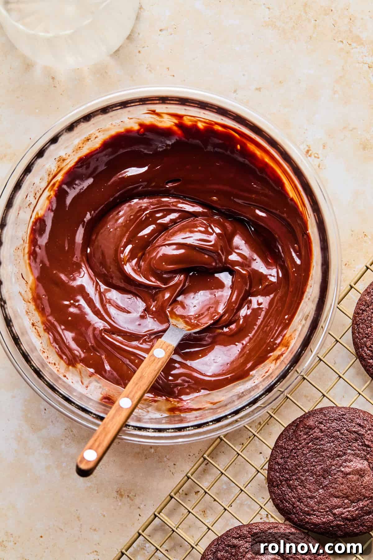 Supernova Brownie Cookies 13 Smooth, glossy chocolate ganache in a glass bowl, perfectly melted and mixed.