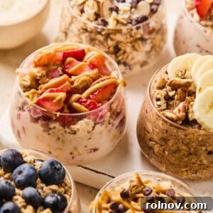 A tempting array of overnight oatmeal prepared in glasses, showcasing various delightful flavors like peanut butter and jelly, banana bread, and blueberry muffin.