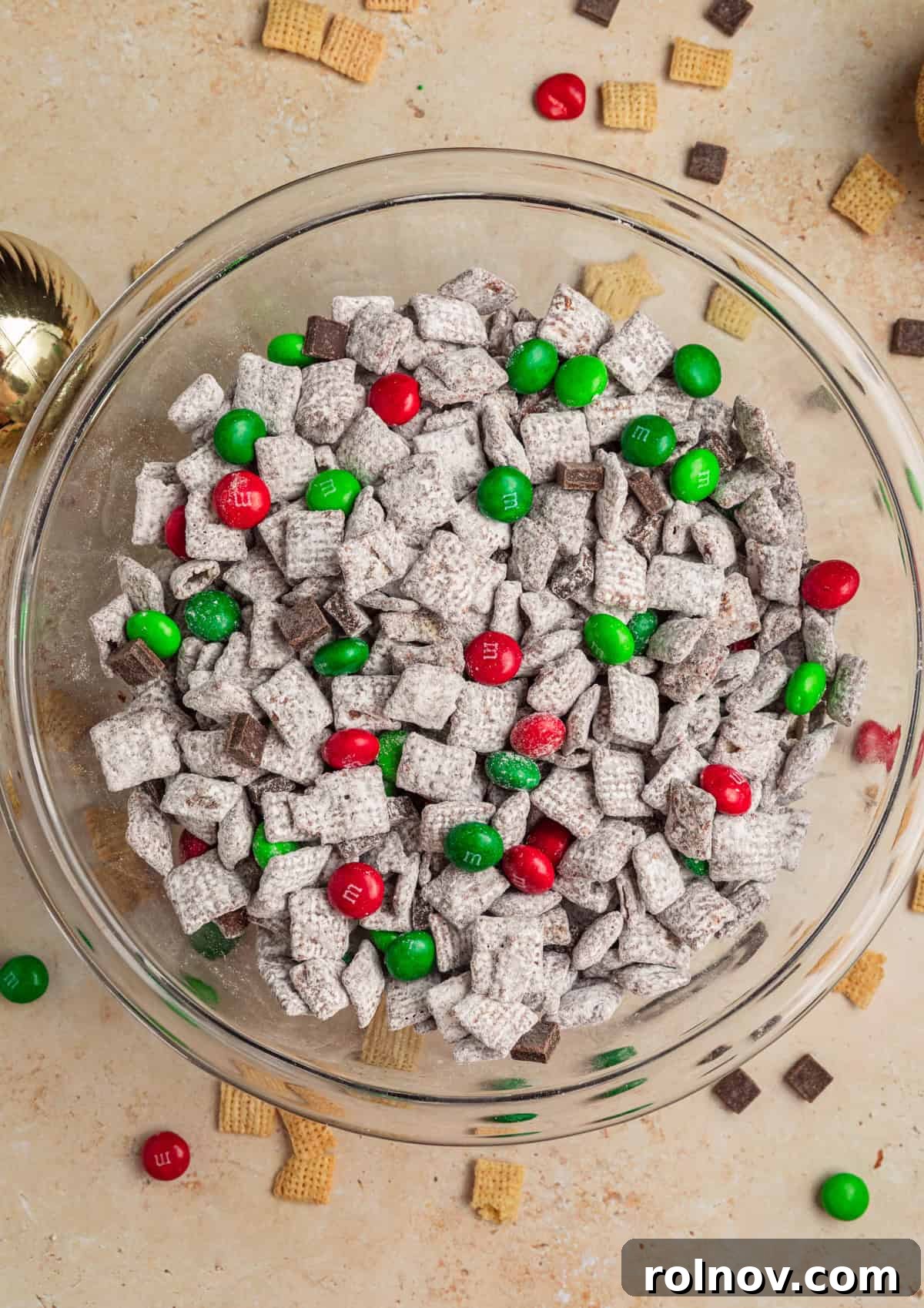 Reindeer Chow Delight 9 A beautiful bowl of Mint Chocolate Christmas Puppy Chow, complete with red and green mint M&Ms, ready to be served.