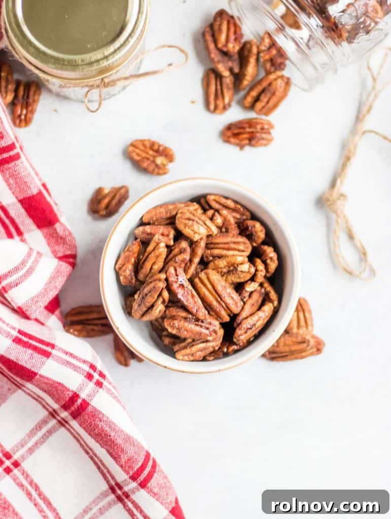 Maple Vanilla Candied Pecans 2 Overhead shot of maple spiced pecans, showcasing their golden hue and perfectly roasted texture.