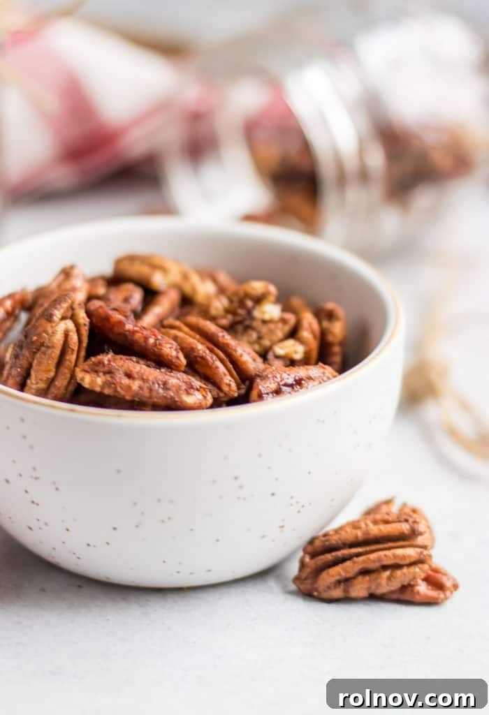 Maple Vanilla Candied Pecans 3 Simple roasted and maple sweetened pecans with a dusting of cinnamon and hints of vanilla are the perfect snack, holiday treat, salad topper and more! This easy spiced pecan recipe makes perfect holiday gifts as well!