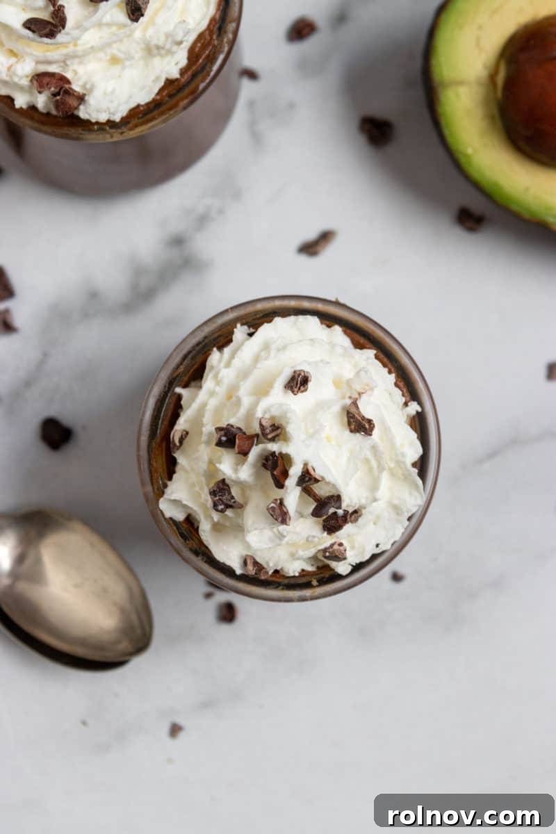 Bailey's Velvet Chocolate Avocado Cloud 5 Overhead shot of avocado mousse with whipped cream.