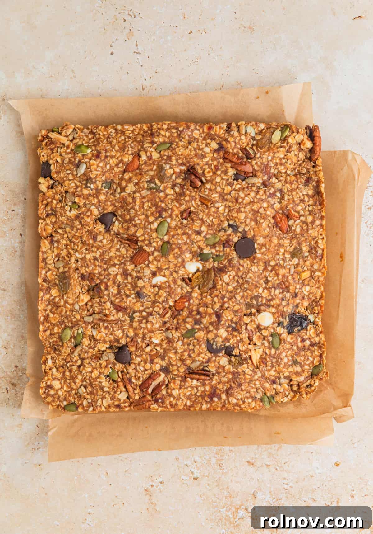 Adventure Fuel Bars 11 Prepared no-bake oat bars, set and ready for slicing, still in the parchment-lined pan.